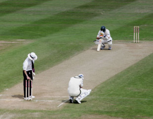 Brett Lee and Michael Kasprowicz sink to their knees after the loss, second Test, England v Australia, Edgbaston, August 7, 2005
