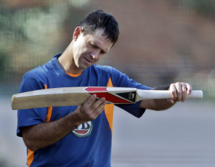 Ricky Ponting checks his bat during training, Bangalore, February 12, 2011