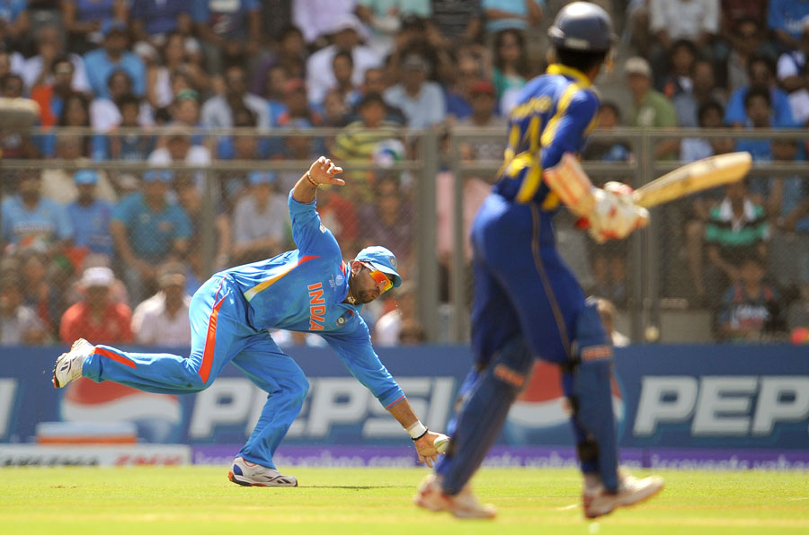 Yuvraj Singh reaches out to stop the ball