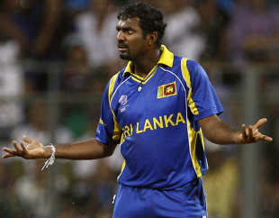 Muttiah Muralitharan is not satisfied with an effort in the field, India v Sri Lanka, final, World Cup 2011, Mumbai, April 2, 2011