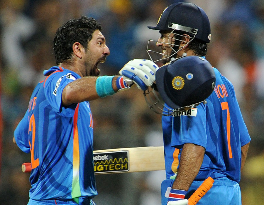 Yuvraj Singh and MS Dhoni celebrate the biggest win of their lives