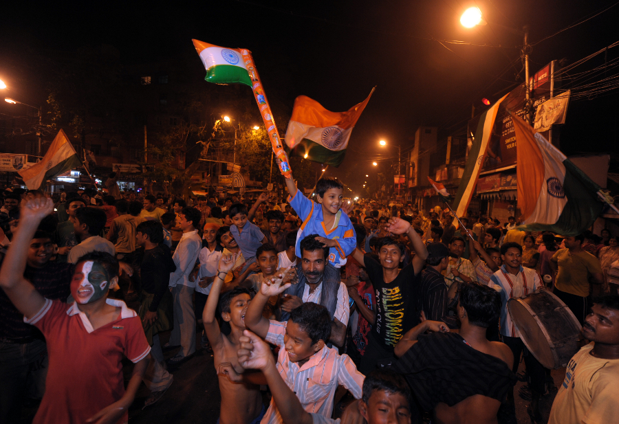 Indian cricket fans celebrate their team's World Cup win on the streets of Kolkata
