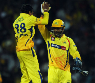 Suraj Randiv and MS Dhoni celebrate a wicket, Chennai v  Kolkata, IPL 2011, Chennai, April 8, 2011