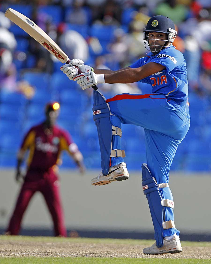 Rohit Sharma swivels to play one behind square