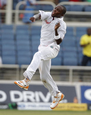 Fidel Edwards leaps after taking his third wicket, West Indies v India, 1st day, 1st Test, Kingston, June 20, 2011