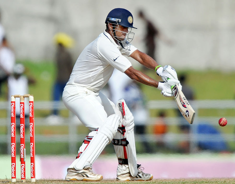 Rahul Dravid is all concentration as he plays the ball to the off side