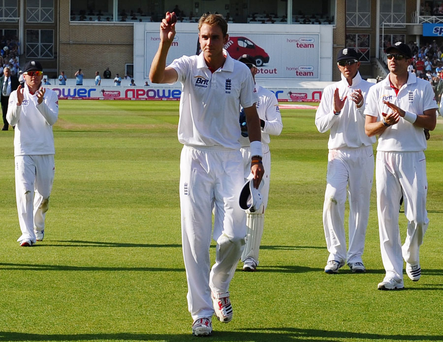 Stuart Broad shows the ball that got him a hat-trick to the crowd 