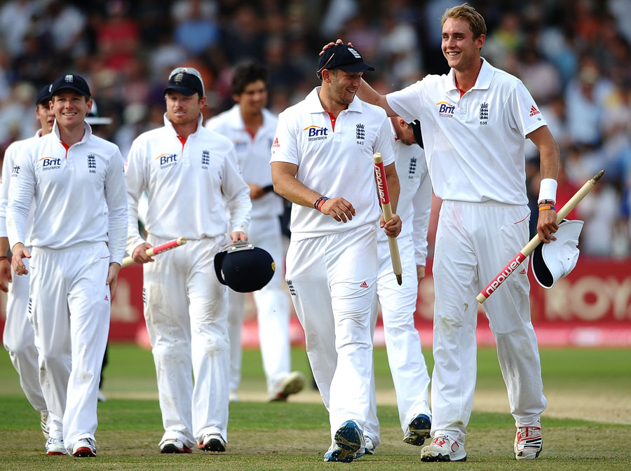 Stuart Broad and Tim Bresnan lead the victorious England side off the field