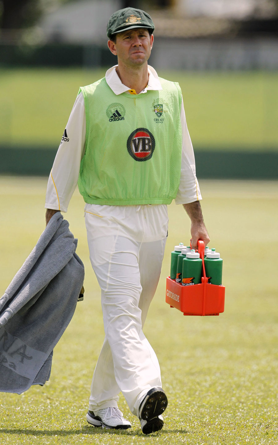 Ricky Ponting carries the drinks for his team-mates 
