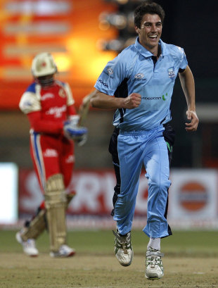 Pat Cummins is overjoyed after picking up the wicket of Tillakaratne Dishan, RCB v NSW, 1st semi-final, CLT20, Bangalore, October 7, 2011