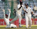 Darren Sammy celebrates Sachin Tendulkar's wicket