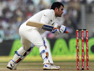 MS Dhoni plays an unconventional shot, India v West Indies, 2nd Test, Kolkata, 2nd day, November 15, 2011