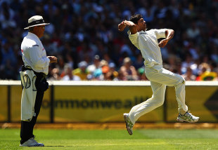 Umesh Yadav leaps before delivery, Australia v India, 1st Test, Melbourne, 2nd day, December 27, 2011