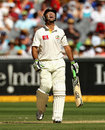 Ricky Ponting reacts after being dismissed