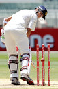 Rahul Dravid is bowled by James Pattinson