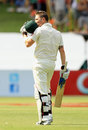 Michael Clarke kisses the Australia crest after completing his century