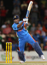 MS Dhoni carves the last ball for three through the covers to tie the game