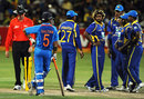 Gautam Gambhir and Sri Lanka await the third umpire's ruling on a run out