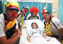 Australia players with a patient at Sydney Children's Hospital