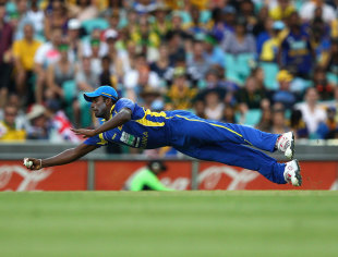 Thisara Perera effects an acrobatic save in the covers that led to Matthew Wade's run out, Australia v Sri Lanka, CB Series, Sydney, February 17, 2012