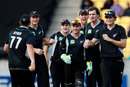 New Zealand gather around Jesse Ryder after he catches Graeme Smith