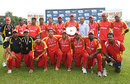Singapore pose with the  ICC World Cricket League Division Five title