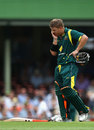David Warner reacts after Michael Hussey is run out