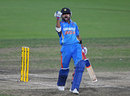 Virat Kohli is ecstatic after completing his century