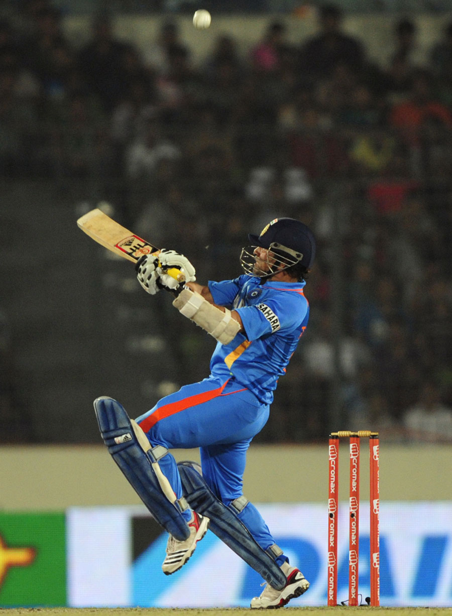 Sachin Tendulkar plays an upper cut for six 