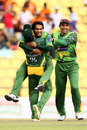 Mohammad Hafeez is congratulated on Kumar Sangakkara's wicket