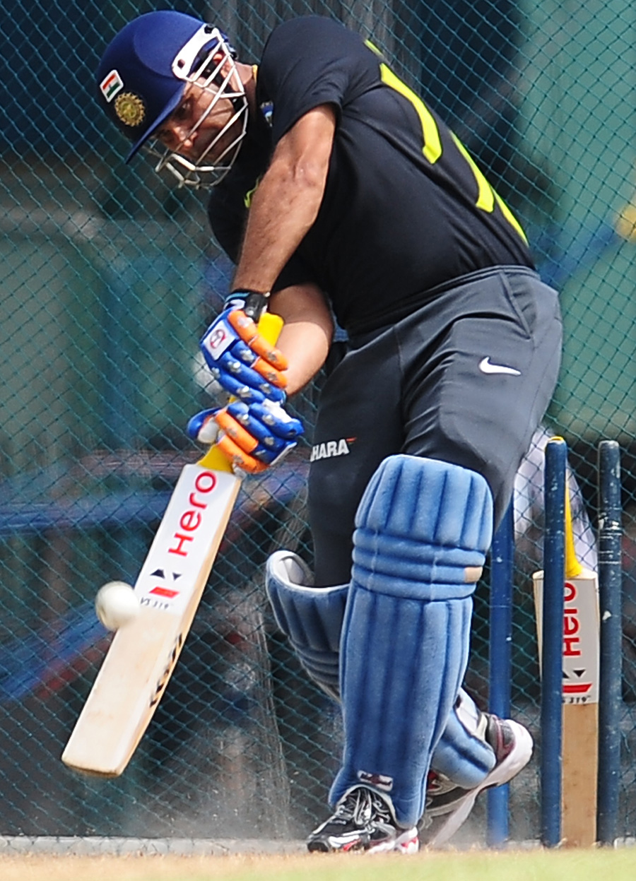 Virender Sehwag bats in a training session