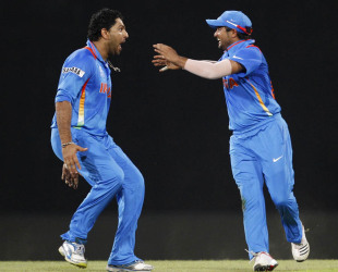 Yuvraj Singh and Suresh Raina celebrate AB de Villiers' wicket, India v South Africa, Super Eights, World Twenty20, Colombo, October 2, 2012