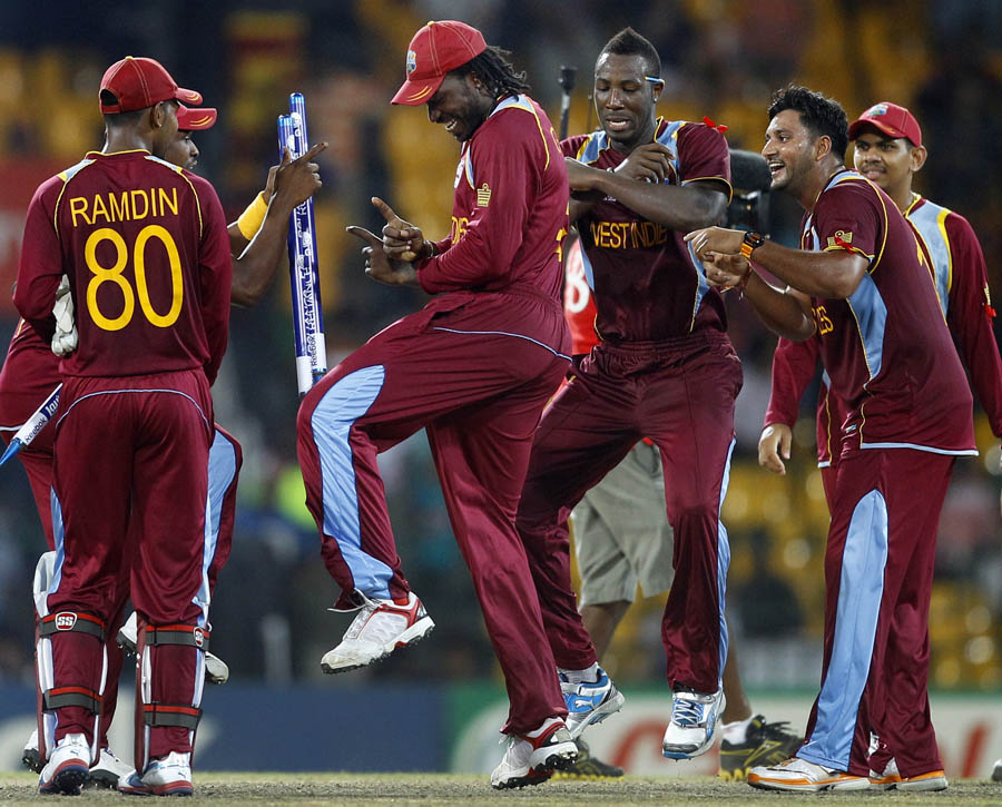 The West Indies team dances to celebrate victory over Australia