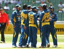 Hughes, run-outs crush Sri Lanka