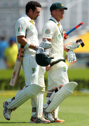 Ed Cowan and David Warner walk back for lunch, India v Australia, 3rd Test, Mohali, 2nd day, March 15, 2013