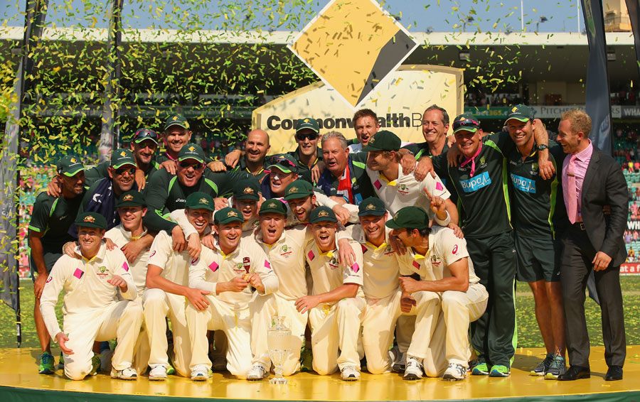 The Australia team and backroom staff celebrate
