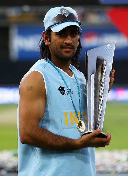 Mahendra Singh Dhoni gets his hands on the ICC World Twenty20 trophy