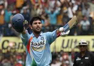 Arm aloft, Yuvraj Singh celebrates his tenth century, India v England, 2nd ODI, Indore, November 17, 2008