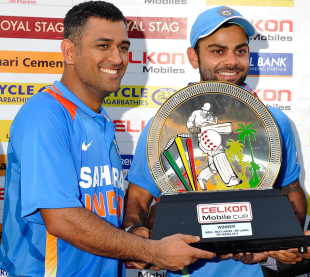 India's captains, MS Dhoni and Virat Kohli, with the tri-series trophy, India v Sri Lanka, tri-series final, Port-of-Spain, July 11, 2013
