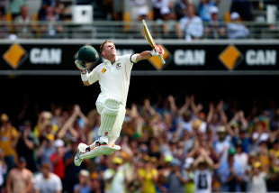 David Warner executes a trademark leap after getting to a hundred, Australia v New Zealand, 1st Test, Brisbane, 1st day, November 5, 2015
